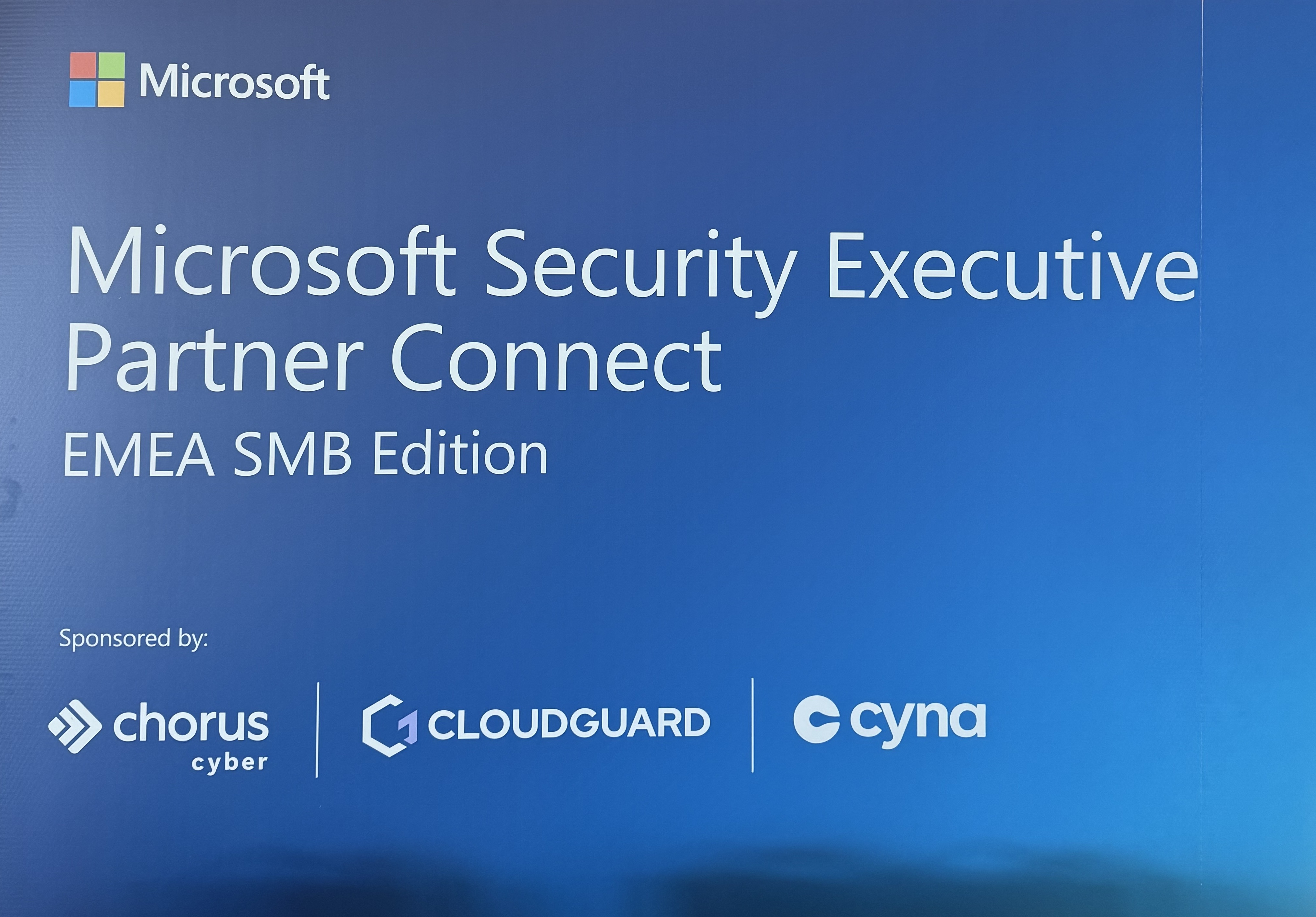 Banner of the Microsoft Security Executive Partner Connect EMEA SMB Edition, sponsored by Cyna in Cascais